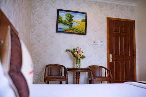Huynh Duc Hotelにあるベッド