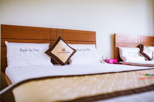 Huynh Duc Hotelにあるベッド