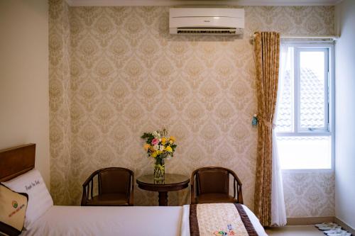 Huynh Duc Hotelにあるベッド