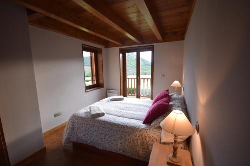 A bed or beds in a room at Casa Estavar Residencial