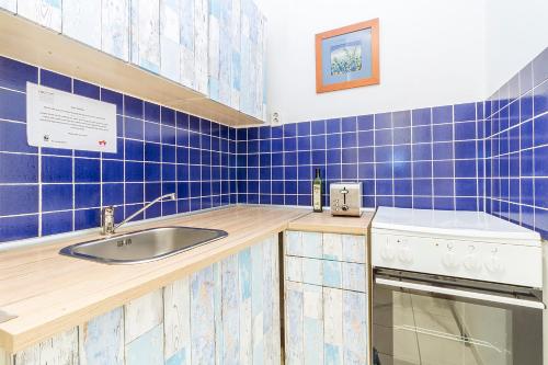 Kuhinja ili čajna kuhinja u objektu Mohinga Apartment