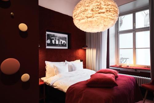 Postel nebo postele na pokoji v ubytování NOFO Hotel, WorldHotels Crafted