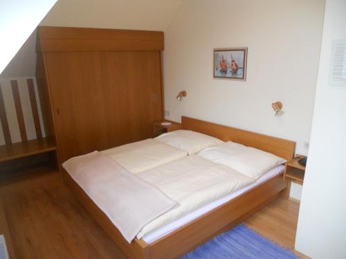 Ένα ή περισσότερα κρεβάτια σε δωμάτιο στο Appartements Schwarzvilla