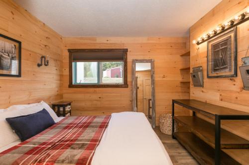 מיטה או מיטות בחדר ב-Warren Lodge