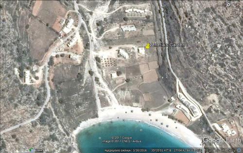 a map of a road and a body of water at Venetia's Garden in Lefkos Karpathou