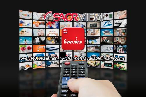 TV a/nebo společenská místnost v ubytování Inishross House