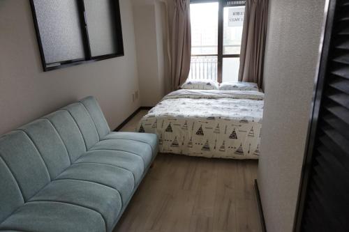 Postel nebo postele na pokoji v ubytování CUBIC.30