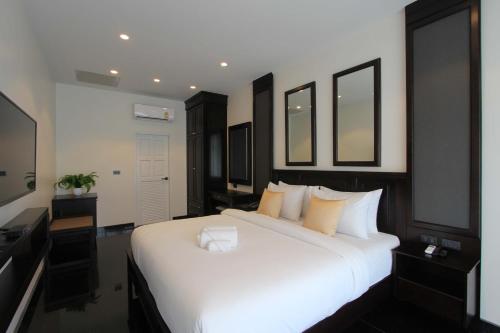 T Villas Hua Hinにあるベッド