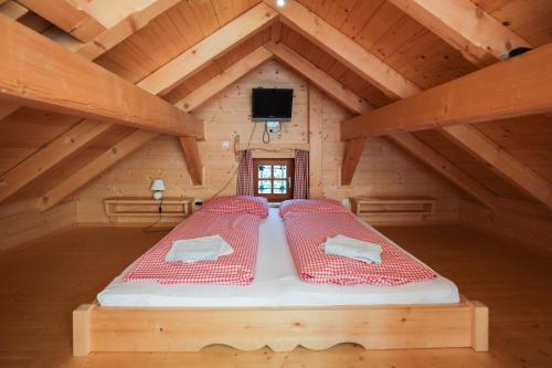 Ein Bett oder Betten in einem Zimmer der Unterkunft Almresort Baumschlagerberg