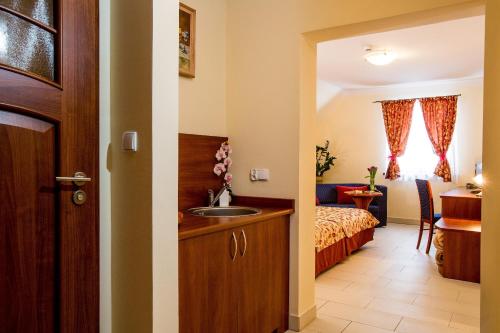 Postel nebo postele na pokoji v ubytování Hotel Concordia