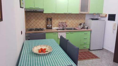 A cozinha ou cozinha compacta de Lungomare Apartment