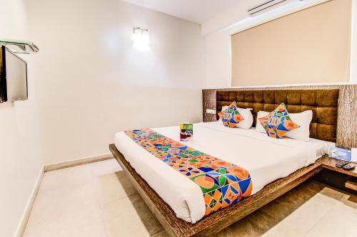Llit o llits en una habitació de Capital Residency