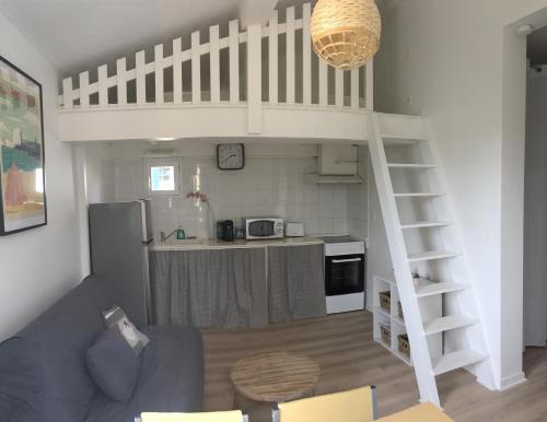 Kuchyň nebo kuchyňský kout v ubytování Appartement les Elfes