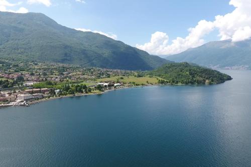 an aerial view of a large body of water with mountains at Hotel Risi in Colico