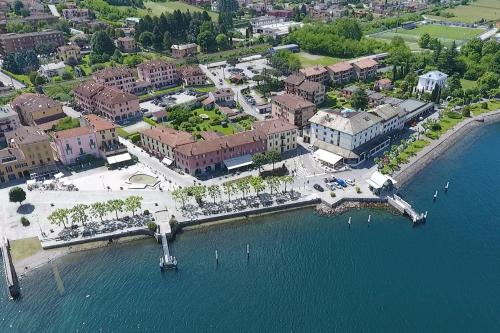 an aerial view of a city with a marina at Hotel Risi in Colico