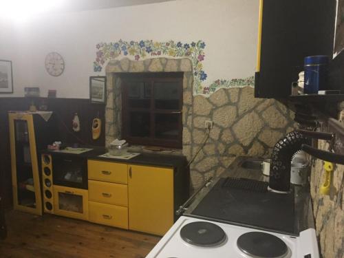 Kuchyň nebo kuchyňský kout v ubytování Kuća za odmor “Iva”