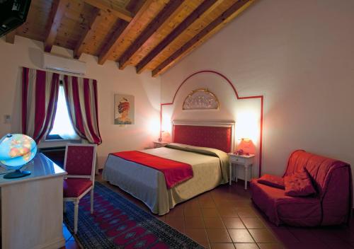 Postel nebo postele na pokoji v ubytování Resort La Mola