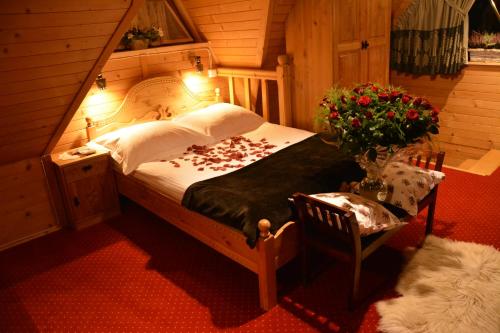Cottage in Tatra - Jacuzzi & Poolにあるベッド