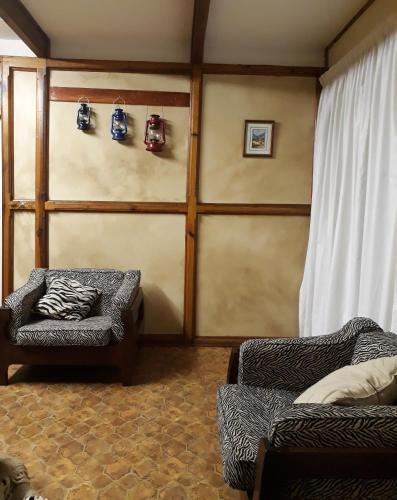 Die Plasie Two-Bedroom Flatにあるシーティングエリア