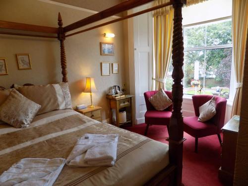 Ένα ή περισσότερα κρεβάτια σε δωμάτιο στο Glendale Guest House