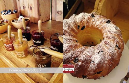 a picture of a blueberry cake on a table at Lifestyle Rooms & Suites by Beau-Séjour in Champéry