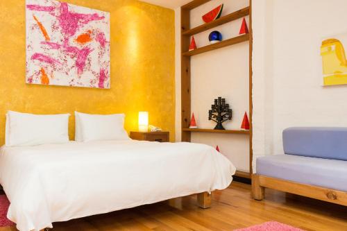 Postel nebo postele na pokoji v ubytování Hotel Casa en el Campo