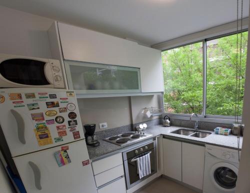 A kitchen or kitchenette at Mansilla Apartment