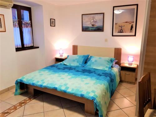 Ένα ή περισσότερα κρεβάτια σε δωμάτιο στο Apartment Noemi