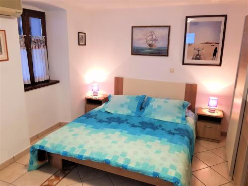 Ένα ή περισσότερα κρεβάτια σε δωμάτιο στο Apartment Noemi