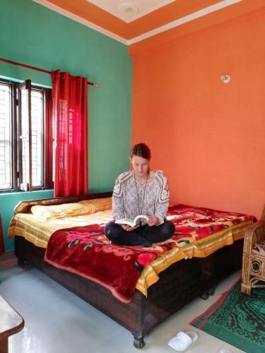 Postel nebo postele na pokoji v ubytování Anjali Home Stay