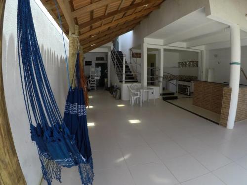 a living room with blue tiled floors and ceilings at Marujo da Gávea in Prado