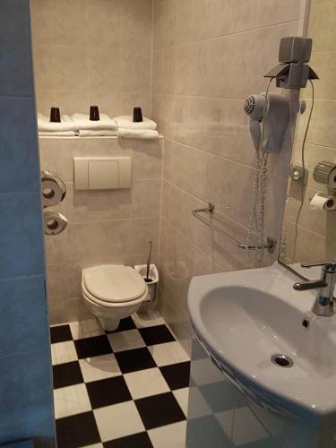 Koupelna v ubytování Hotel Baan