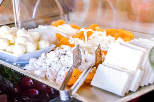 a display of different types of cheese and fruit at 4reasons hotel + bistro | 12+ in Yalıkavak