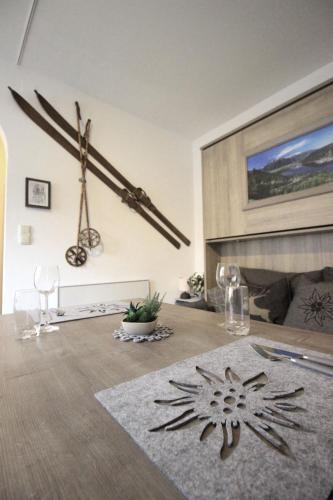 a living room with a snowflake decoration on the wall at Apartment Edelweiss in Zell am See