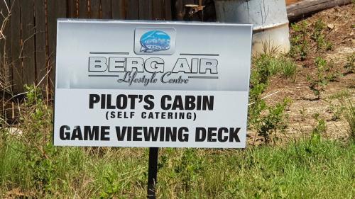 a sign for a video game viewing deck at Pilot's Cabin, El Mirador Airfield in Champagne Valley