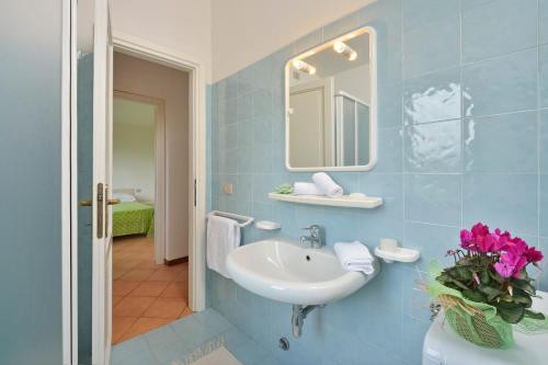 Ett badrum på Residence Le Canne