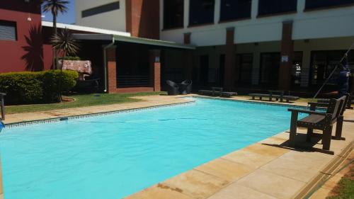 Πισίνα στο ή κοντά στο Strelitzia Apartment