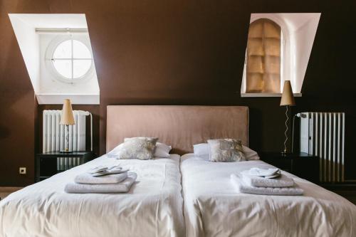 Ліжко або ліжка в номері Kasteel Pietersheim