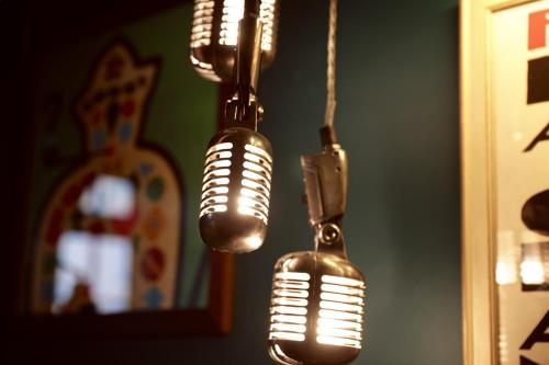 two lights hanging from a string in a room at The Bedford Balham - Live Music Venue in London