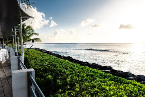a view of the ocean from a resort at The Palms Resort in Saint James
