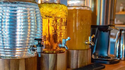 a close up of two glass bottles on a counter at Litli Geysir Hotel in Haukadalur