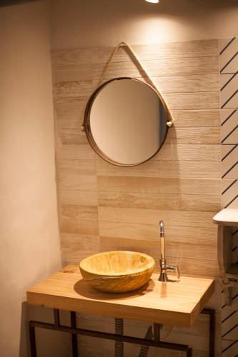 a bathroom with a sink and a mirror at Casa Provenzal in Villa de Leyva