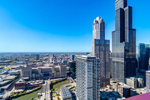 an aerial view of a city with tall buildings at The Buckingham Hotel in Chicago