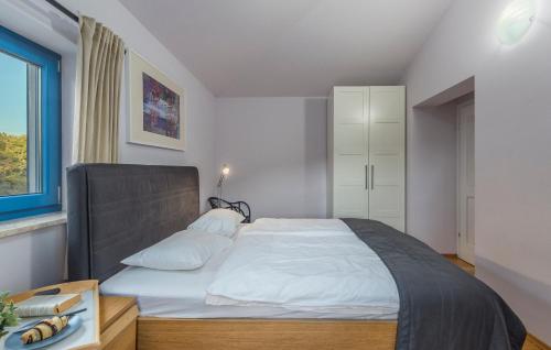 Postel nebo postele na pokoji v ubytování Villas Adagio