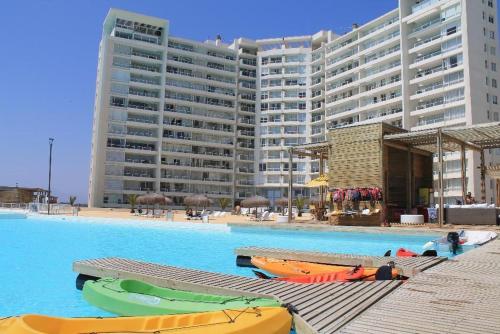 The swimming pool at or close to DEPARTAMENTO FRENTE AL MAR EN RESORT Laguna del Mar 7P