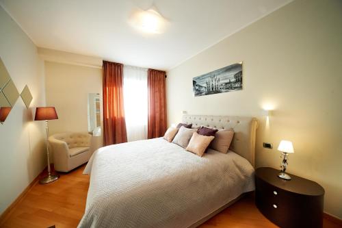 Llit o llits en una habitació de You in Milano