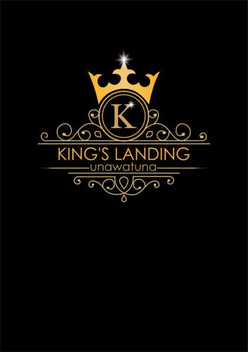 a gold crown and a kings landling logo at Kings Landing Unawatuna in Unawatuna