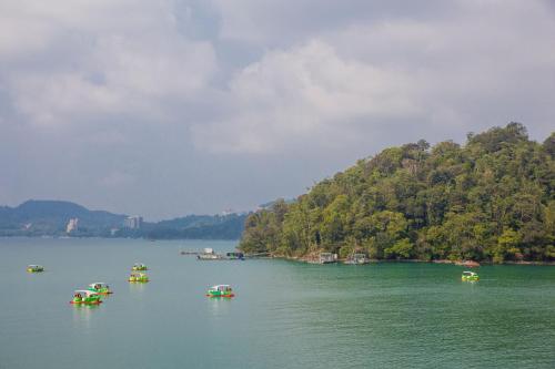 a group of boats in a large body of water at Yuan Su B&B in Yuchi