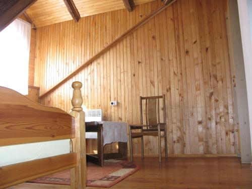 Posteľ alebo postele v izbe v ubytovaní Salako svečių namai