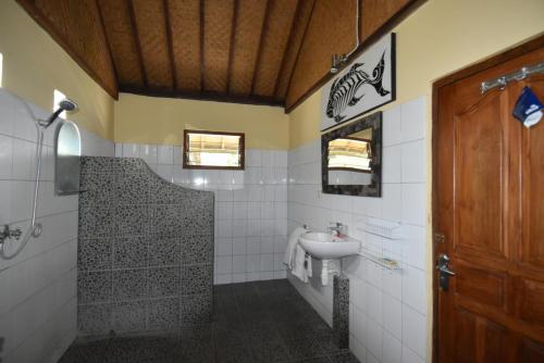 Phòng tắm tại Villa Ganesha, Banjar Beach, Lovina